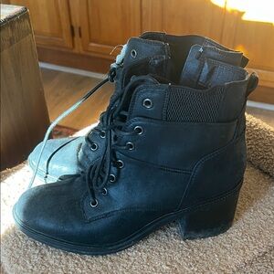 Heeled combat boots in soft black suede/leather